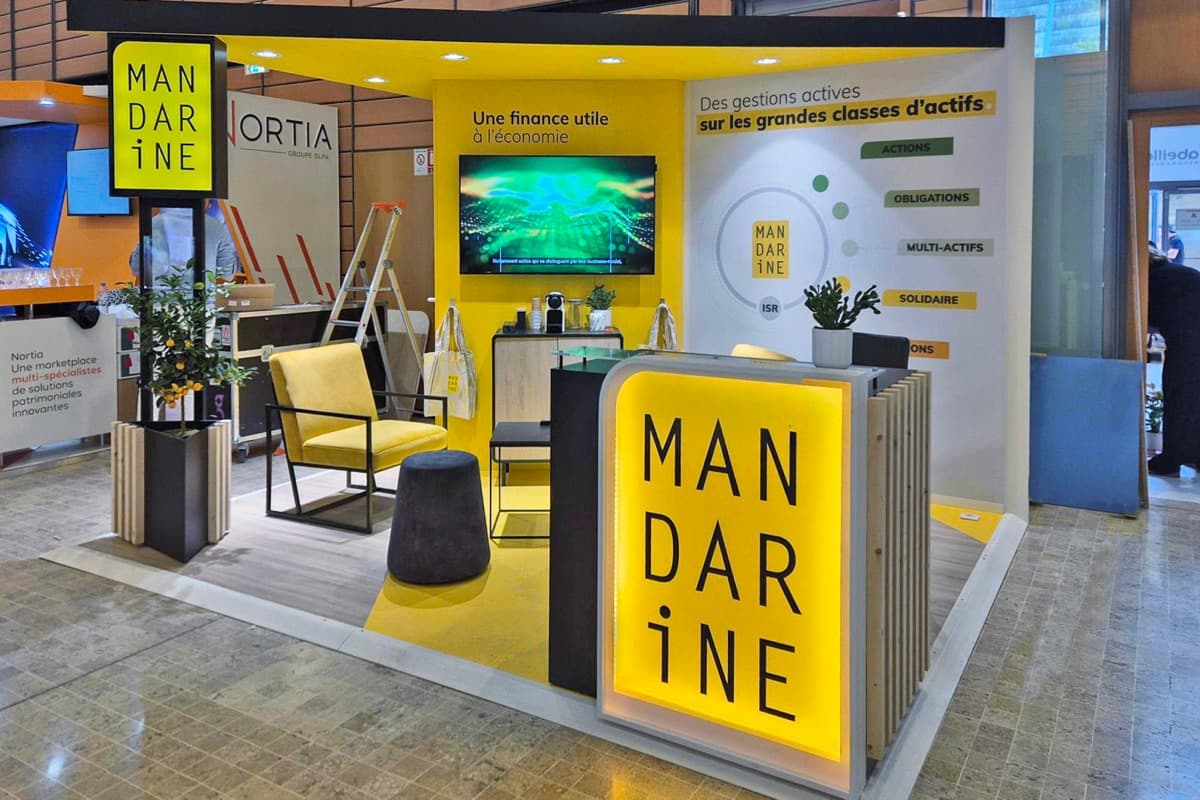 Stand Mandarine Gestion à Patrimonia, espaces de rendez-vous privés et identité visuelle sobre, conçu et réalisé par The Good Experience
